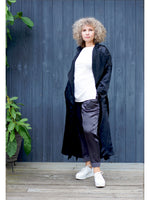 A NAIMA SILK FEEL BELTED TRANSITION TRENCH COAT IN BLACK