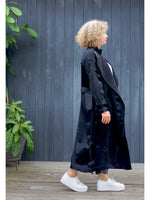 A NAIMA SILK FEEL BELTED TRANSITION TRENCH COAT IN BLACK