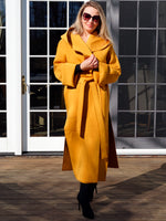 A MELODY COAT IN MARIGOLD