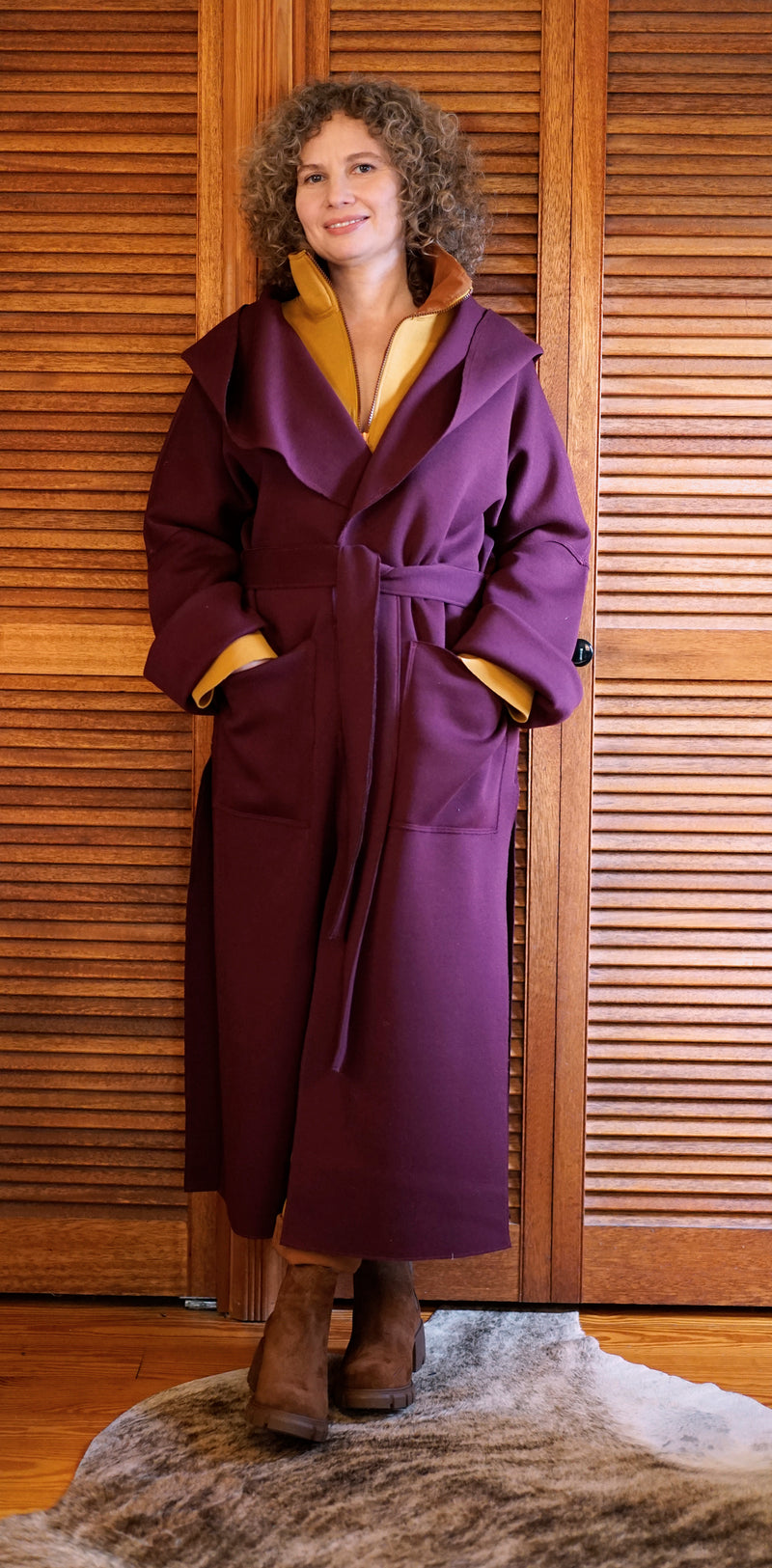 A MELODY COAT IN MERLOT